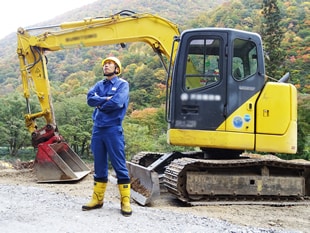 重機と米井